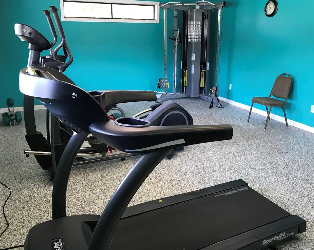 Picture of the Gulf Highlands Beach Resort Gym with a treadmill and an exercise bike